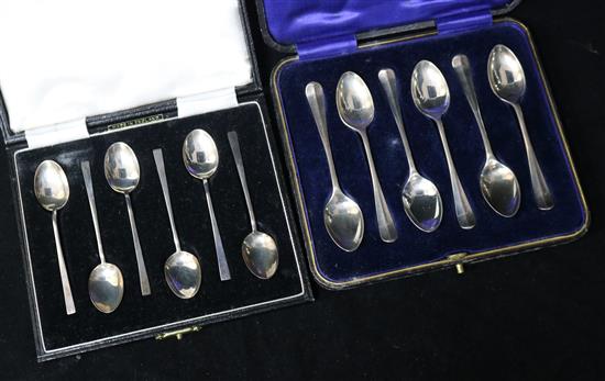 Two cased sets of silver teaspoons